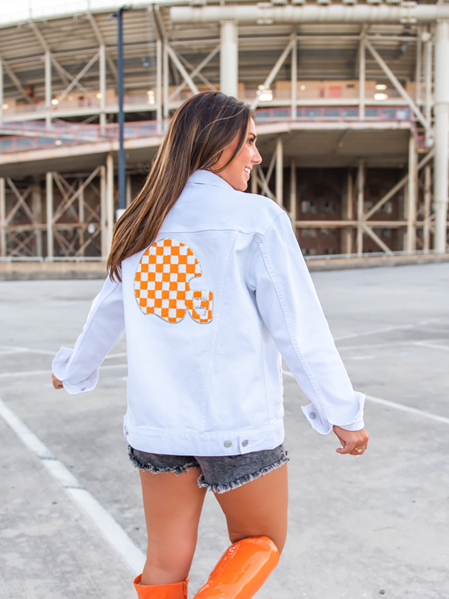 White Denim Jacket with Orange Helmet Patch on Back