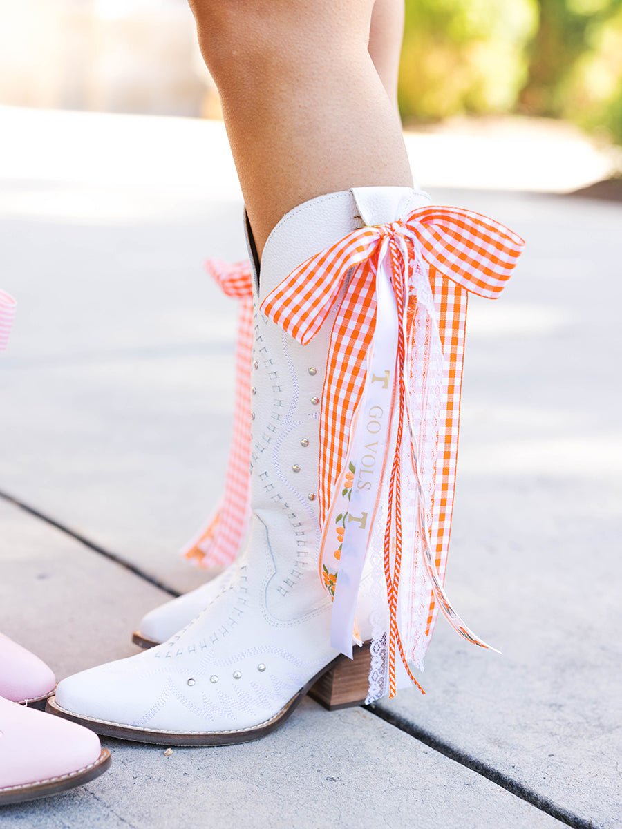 Orange and white VOLS boot bows