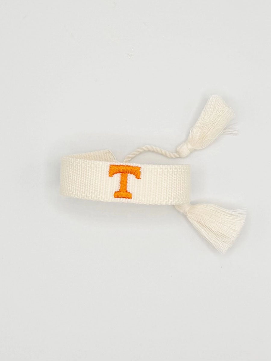 white bracelet with "Power T"