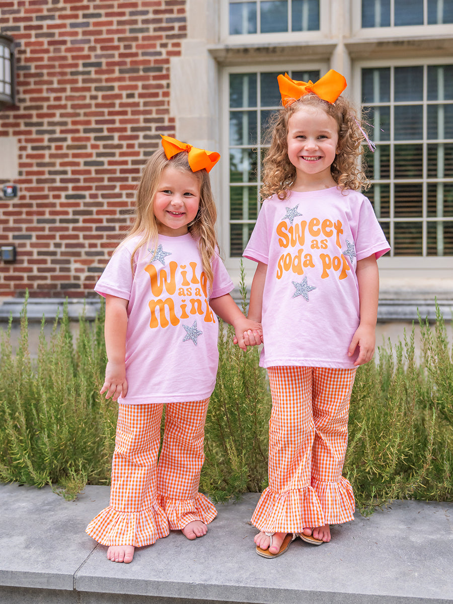 Ruffled orange and white pants